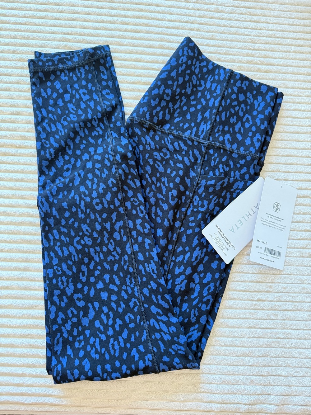 Athleta Salutation Stash pocket 7/8 tights - size Medium Tall